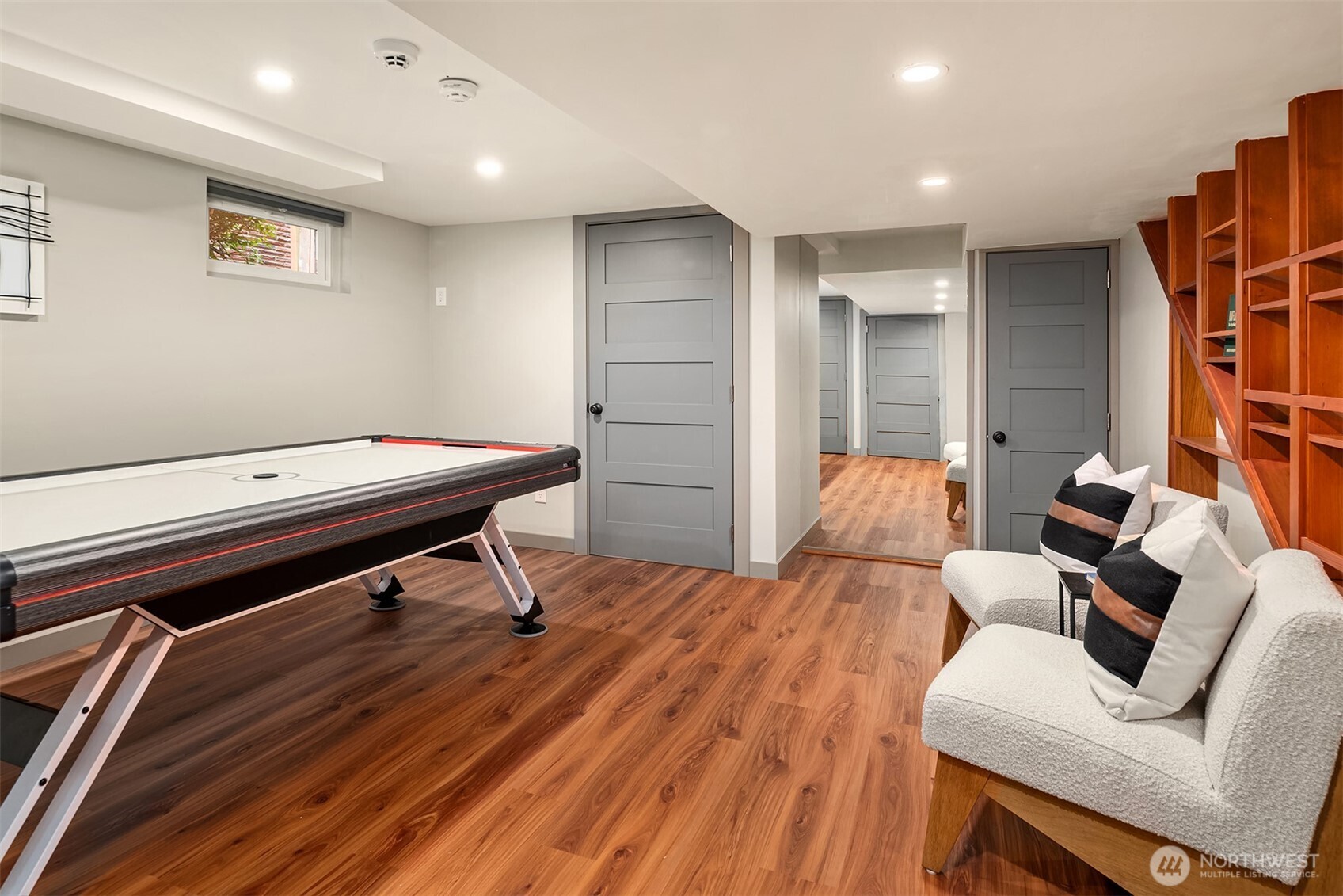 2252 Viewmont Way West Seattle, WA 98199 - Photo 34 of 40 a room with furniture pool table and a wooden floor