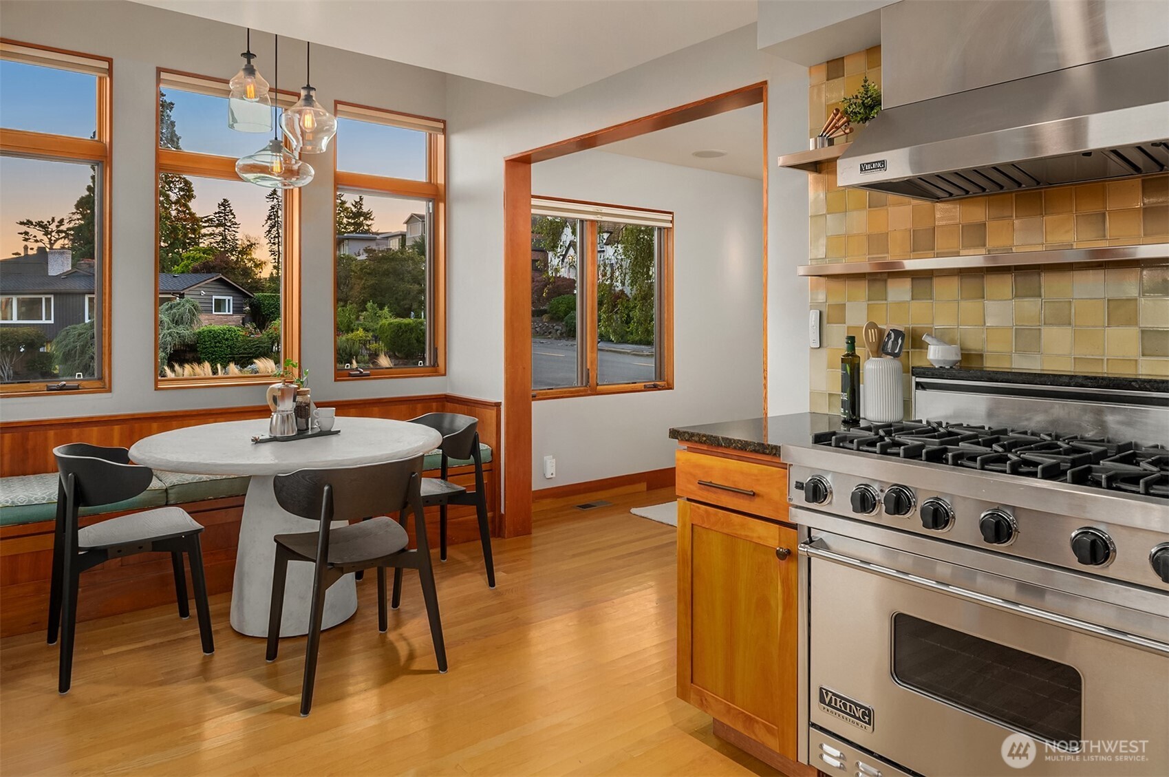 2252 Viewmont Way West Seattle, WA 98199 - Photo 10 of 40 a kitchen with a stove a sink and a table