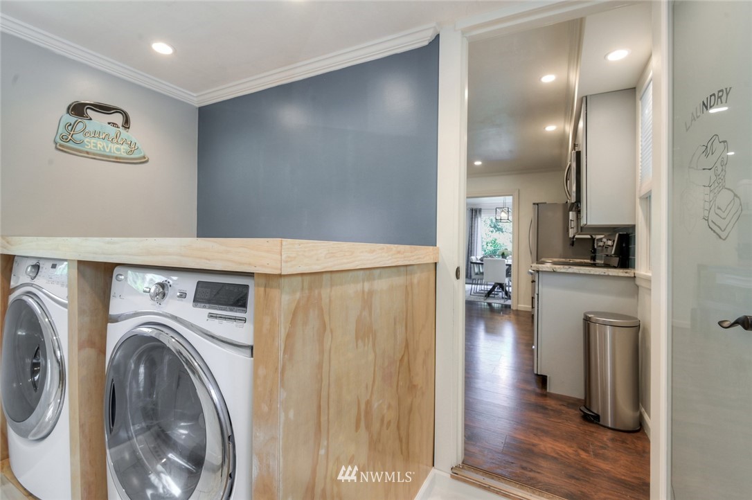 5802 Cady Road Everett, WA 98203 - Photo 20 of 25 a view of a hallway with washer and dryer