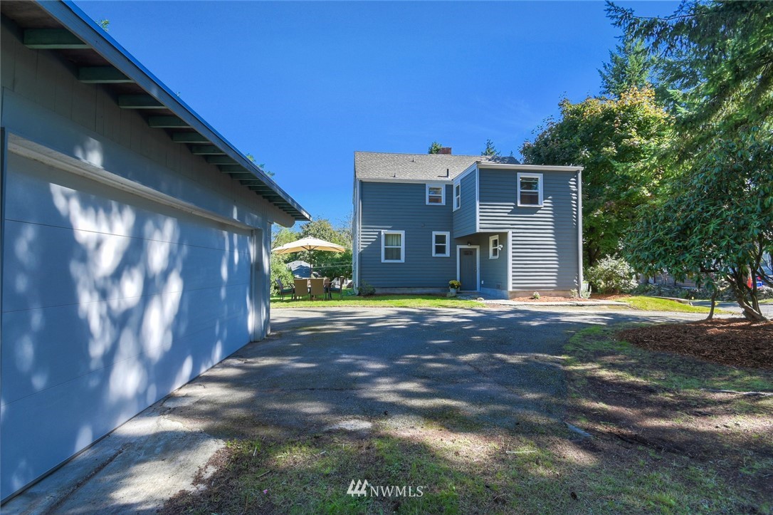 5802 Cady Road Everett, WA 98203 - Photo 21 of 25 a view of a house with a yard