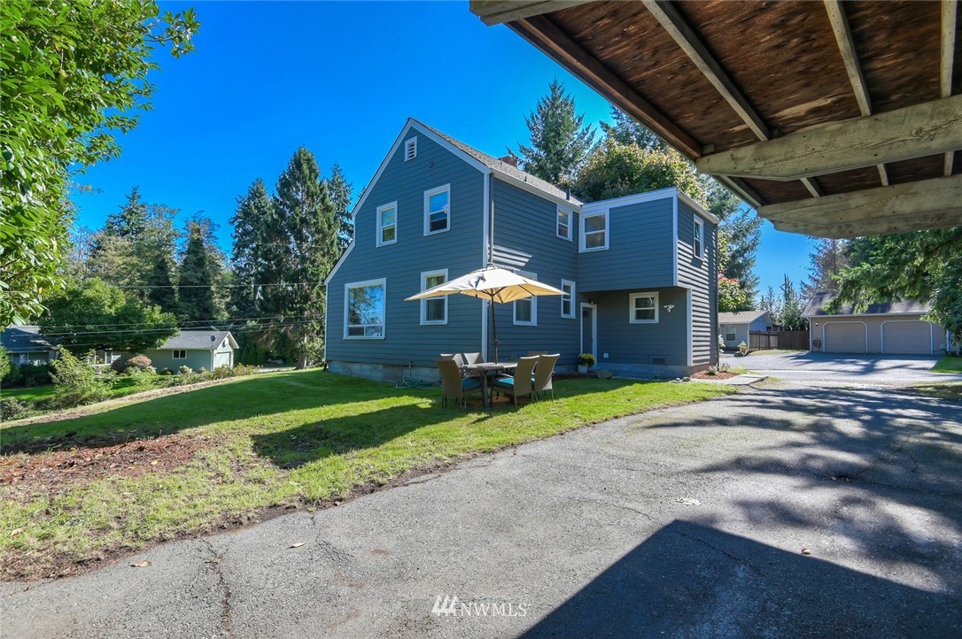 5802 Cady Road Everett, WA 98203 - Photo 23 of 25 a front view of a house with a yard and pathway