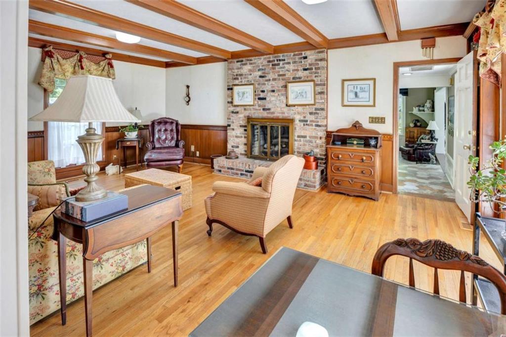 103 Gabriel Way Social Circle, GA 30025 - Photo 23 of 70 a living room with furniture and a fireplace