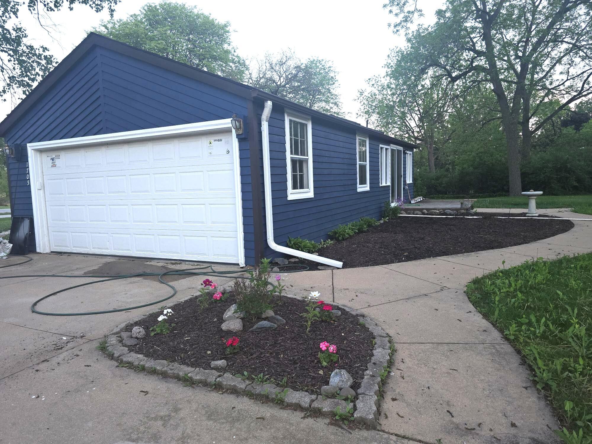 1705 South Calhoun Road New Berlin, WI 53146 - Photo 2 of 14 Calhoun garage