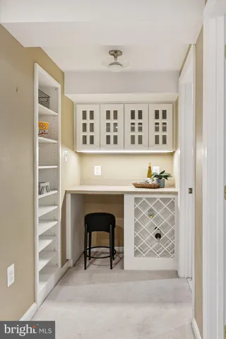 a view of living room with furniture and window