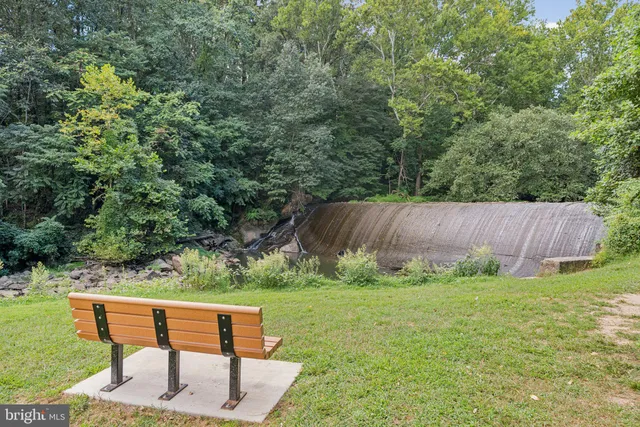 a garden view with a seating space