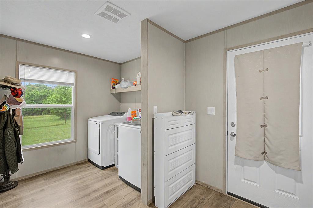 6065 Timber Trail Azle, TX 76020 - Photo 20 of 33 a room with storage and utility