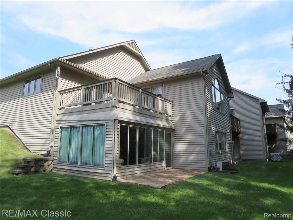 Back view   ...yes wonderful Florida Room and upper deck for your enjoyment 