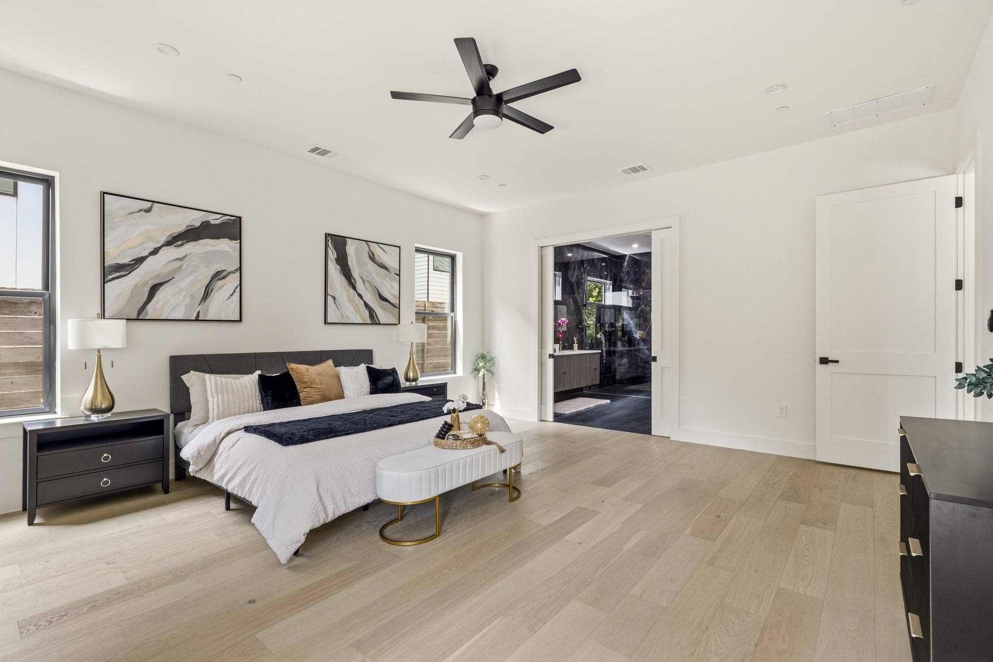 2300 Bluebonnet Lane Austin, TX 78704 - Photo 16 of 40 a bedroom with a bed and wall painting