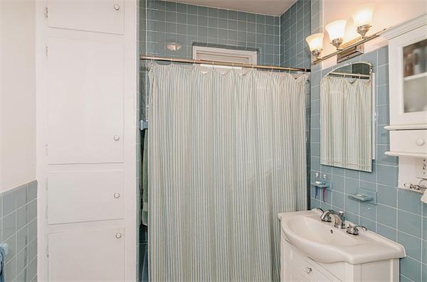 5 Colliston Road, Unit 1 Boston, MA 02135 - Photo 9 of 11 a bathroom with a sink a vanity and a shower