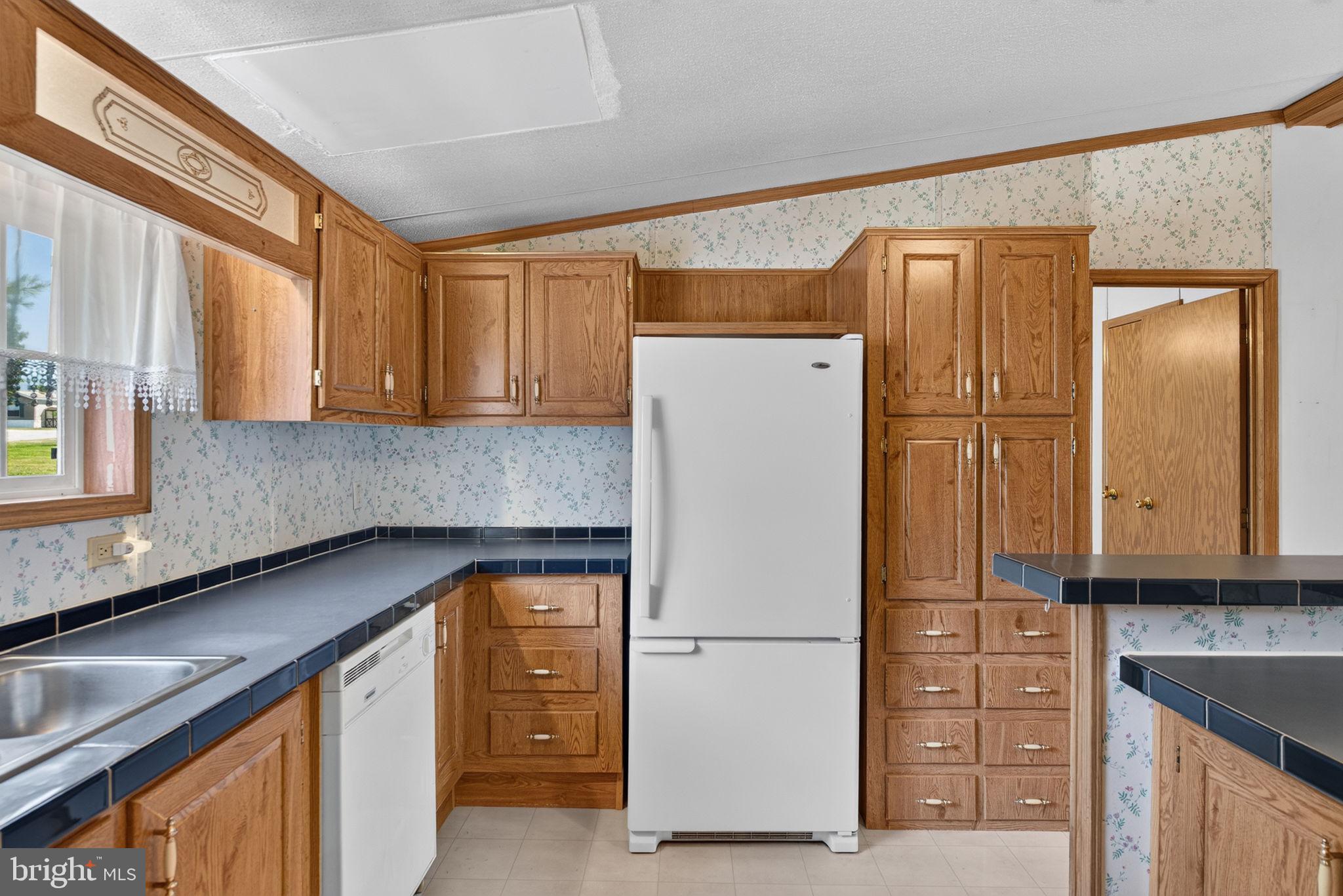 1910 Schubert Road, Unit 8 Bethel, PA 19507 - Photo 11 of 40 Refrigerator conveys as well