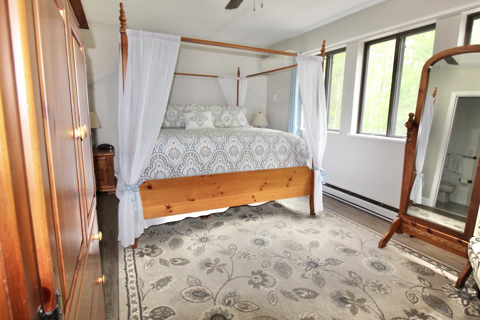 25 Round House Road Bourne, MA 02532 - Photo 13 of 32 a bed room with a bed and a window