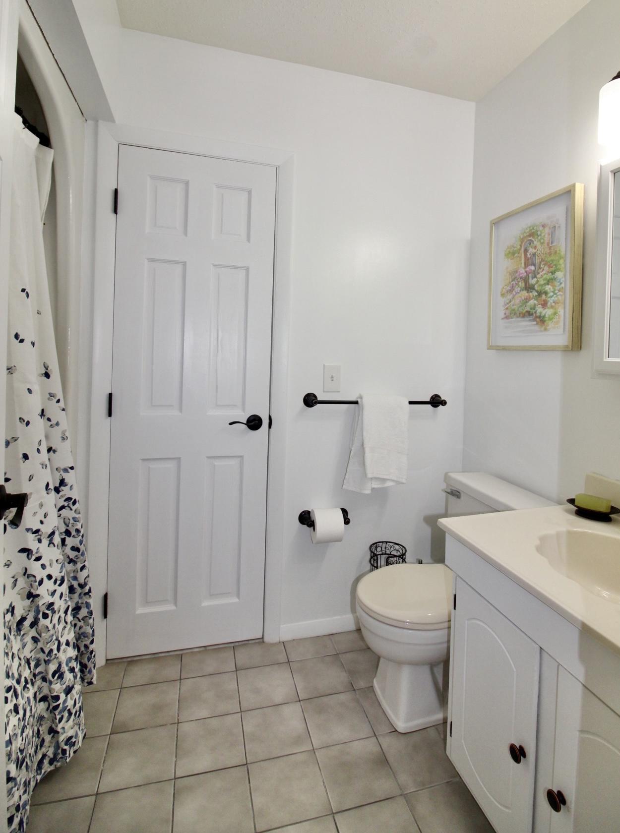 25 Round House Road Bourne, MA 02532 - Photo 18 of 32 a bathroom with a sink toilet and shower