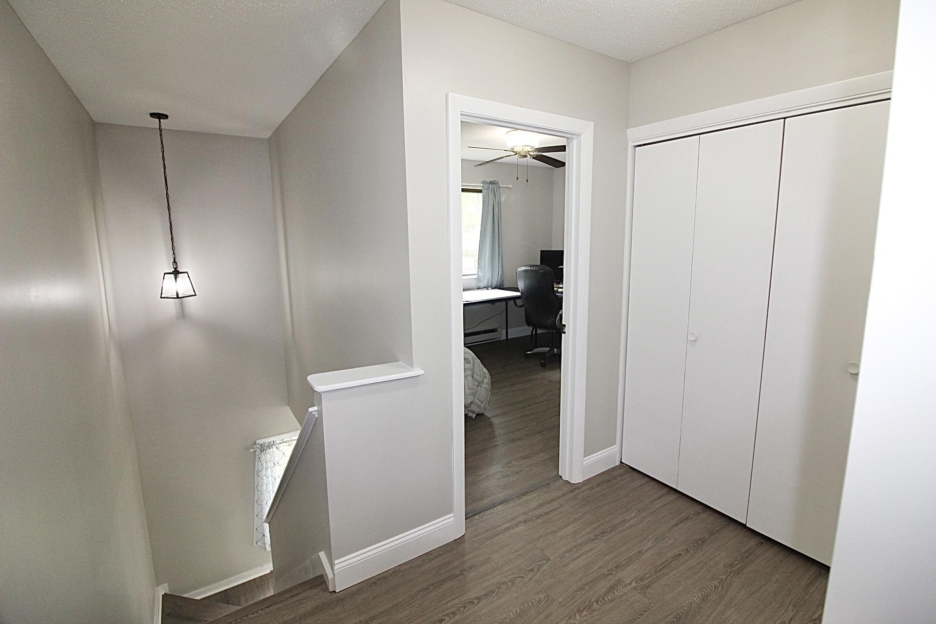 25 Round House Road Bourne, MA 02532 - Photo 21 of 32 a view of walk in closet with hardwood floor