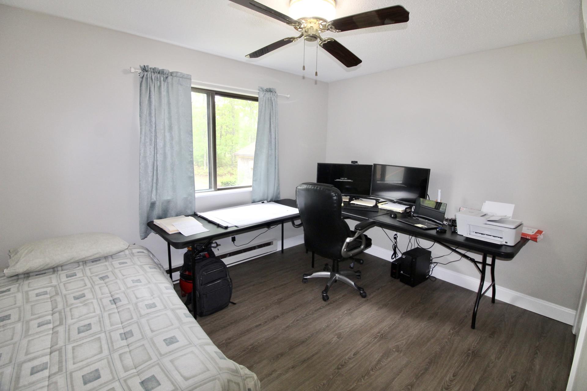 25 Round House Road Bourne, MA 02532 - Photo 23 of 32 a view of a workspace with furniture and a window