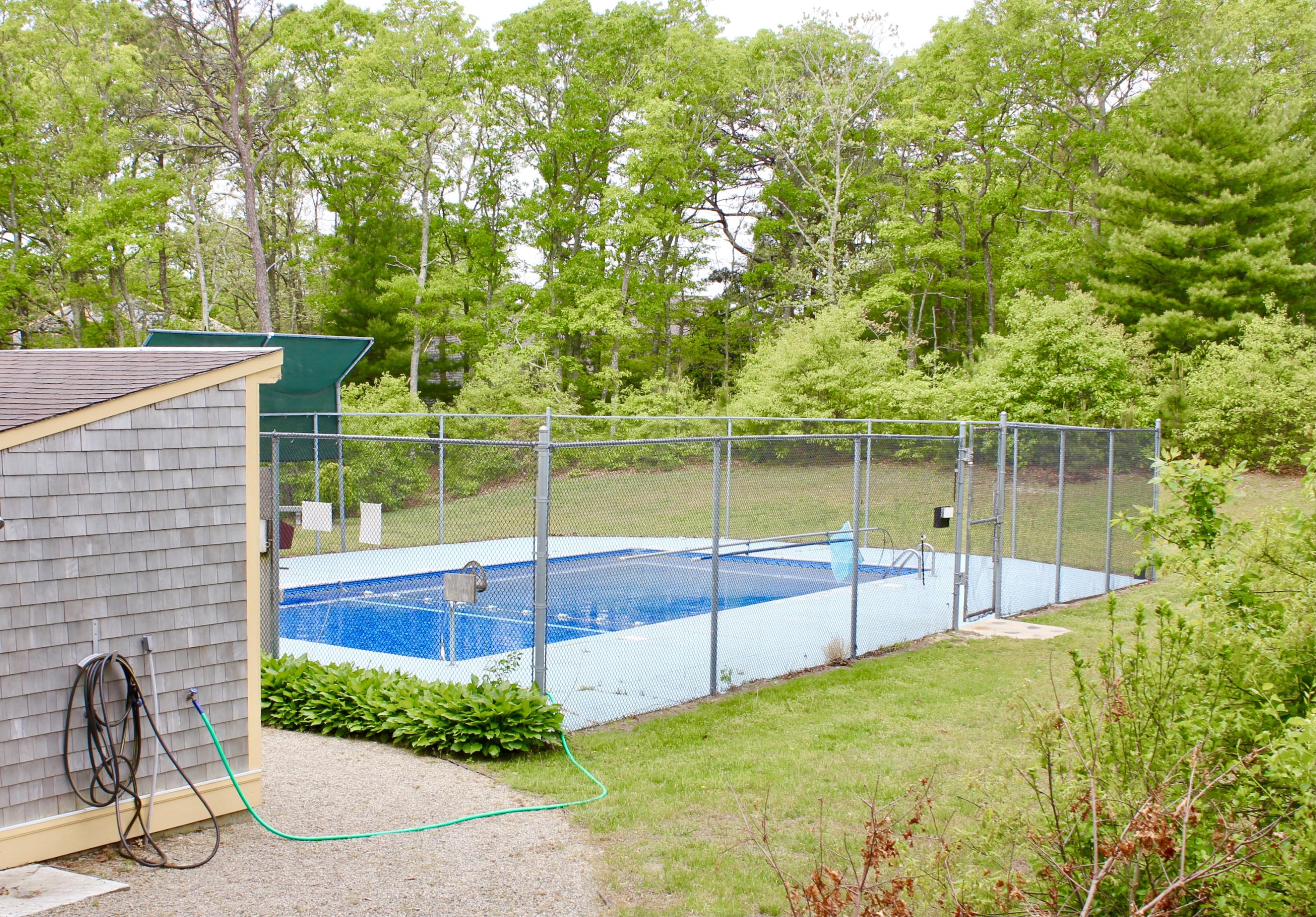 25 Round House Road Bourne, MA 02532 - Photo 29 of 32 a view of a backyard with swimming pool