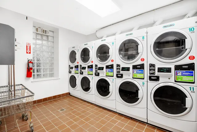 a view of a patio with table and chairs and potted plants