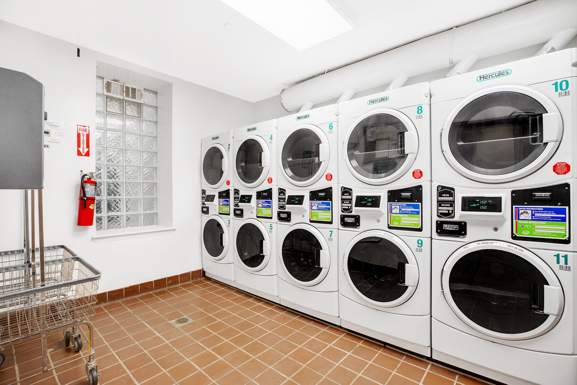 2322 Adam Clayton Powell Jr Boulevard, Unit 3F Manhattan, NY 10030 - Photo 10 of 14 a utility room with dryer and washer