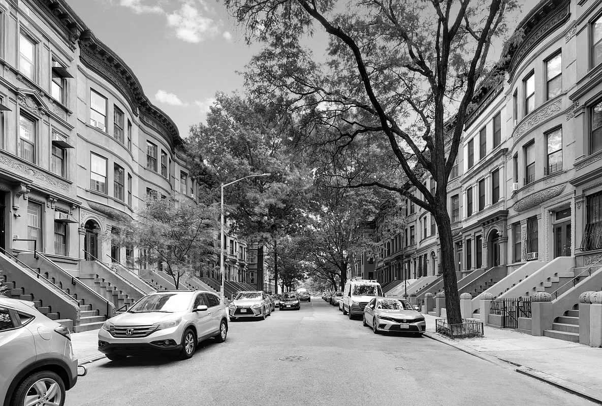 2322 Adam Clayton Powell Jr Boulevard, Unit 3F Manhattan, NY 10030 - Photo 12 of 14 a view of a cars park in front of a building