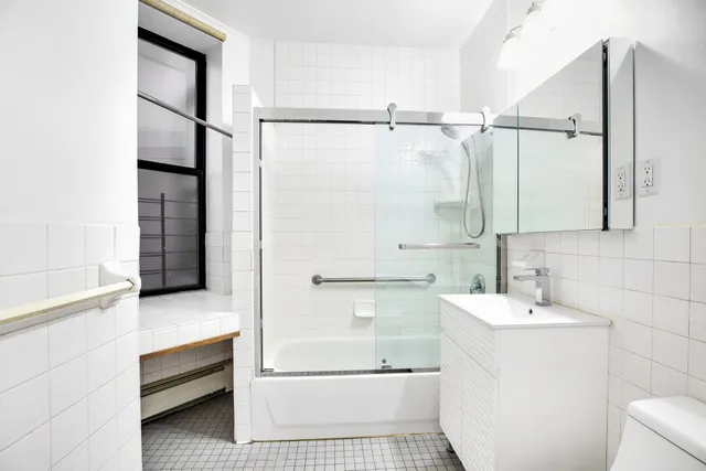 a workspace with furniture and window