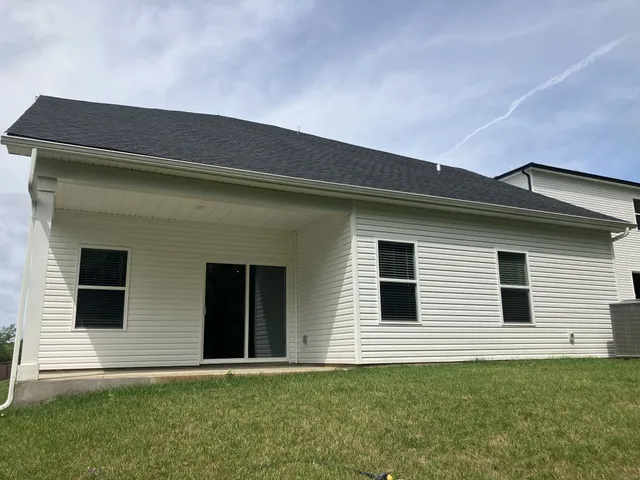 a house that has a window in front of it