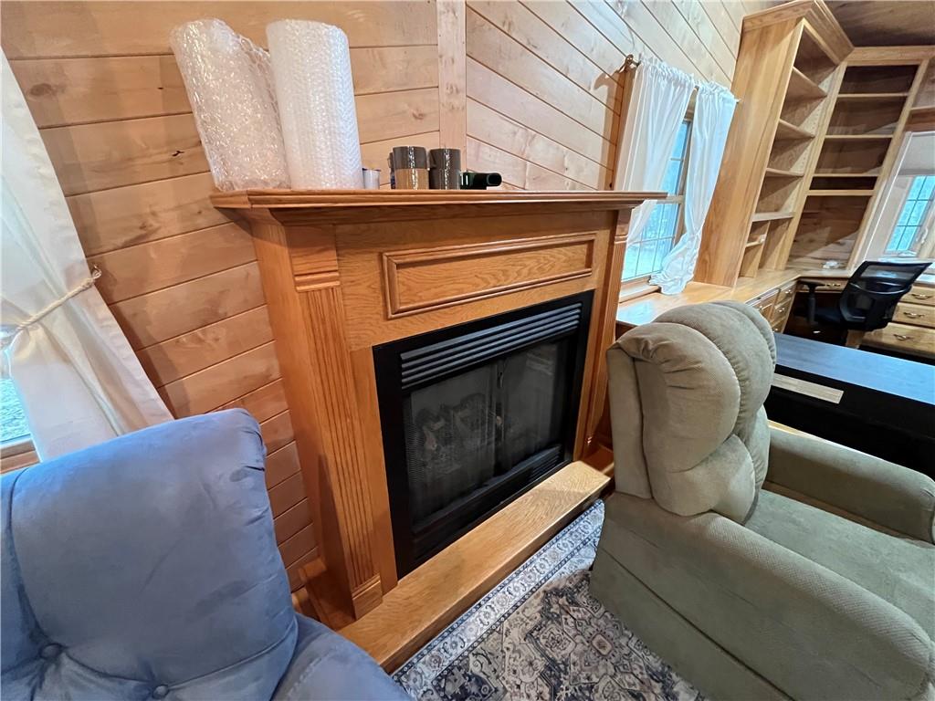 83 Seger Road Punxsutawney, PA 15767 - Photo 11 of 24 a living room with furniture and a fireplace