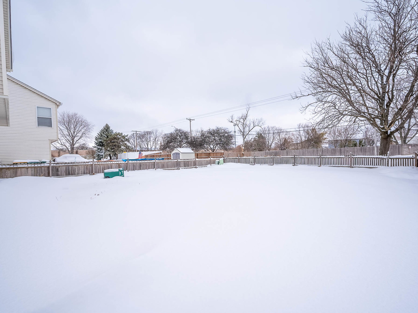 2084 Kentland Drive Romeoville, IL 60446 - Photo 15 of 15 a view of a yard with a snow on the road