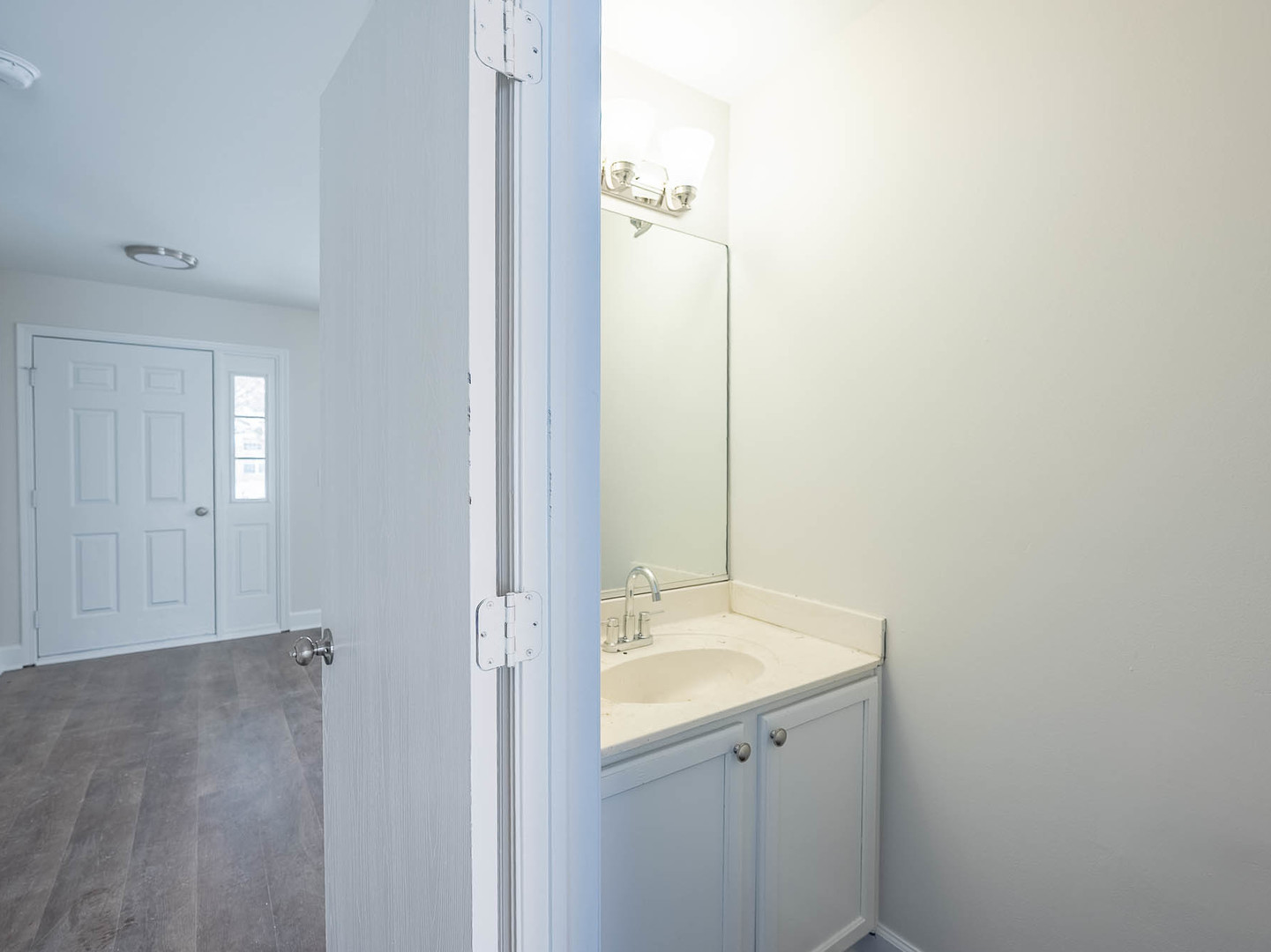2084 Kentland Drive Romeoville, IL 60446 - Photo 3 of 15 a bathroom with a sink and mirror