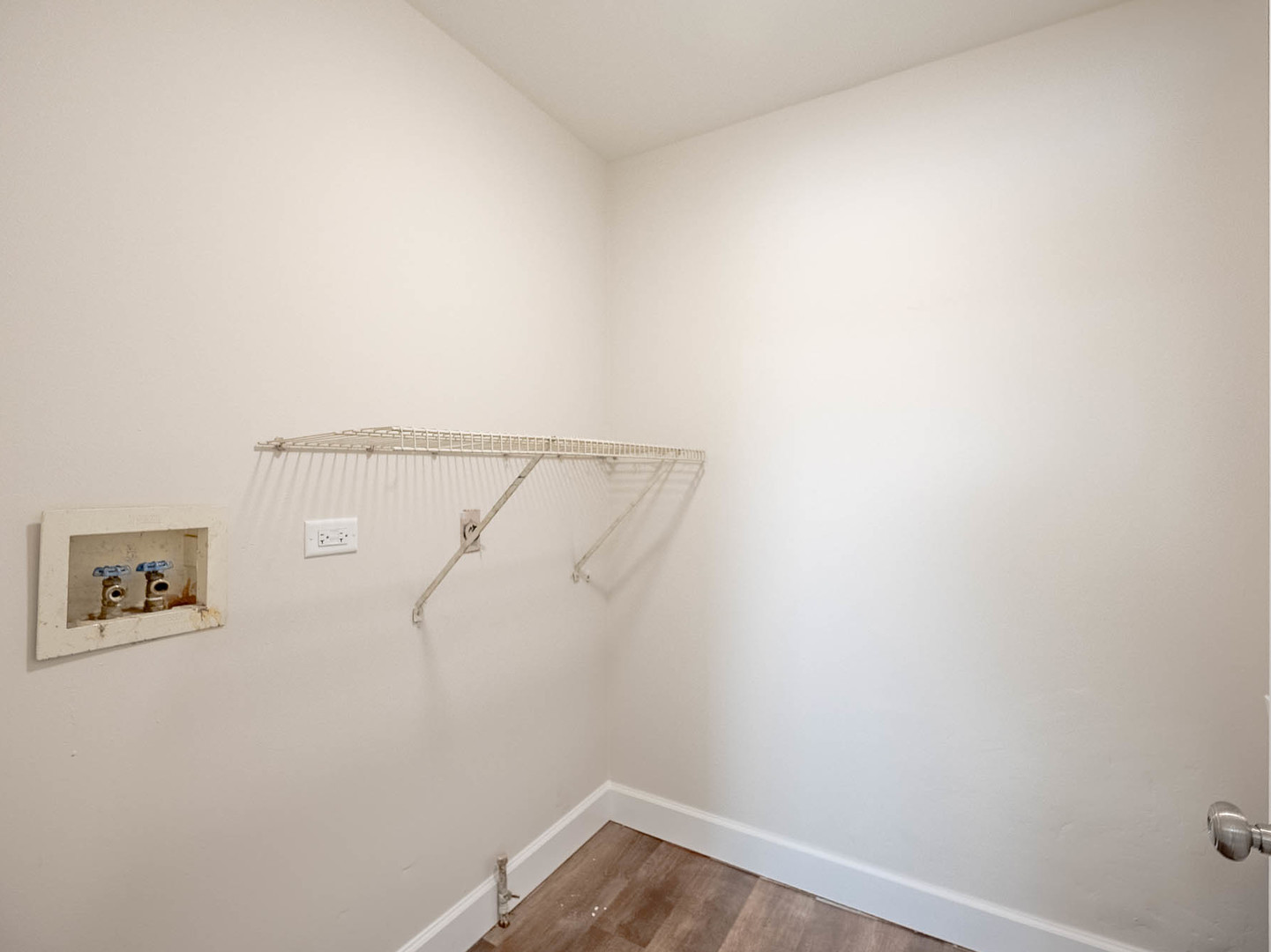 2084 Kentland Drive Romeoville, IL 60446 - Photo 6 of 15 a view of small space with empty racks on the wall