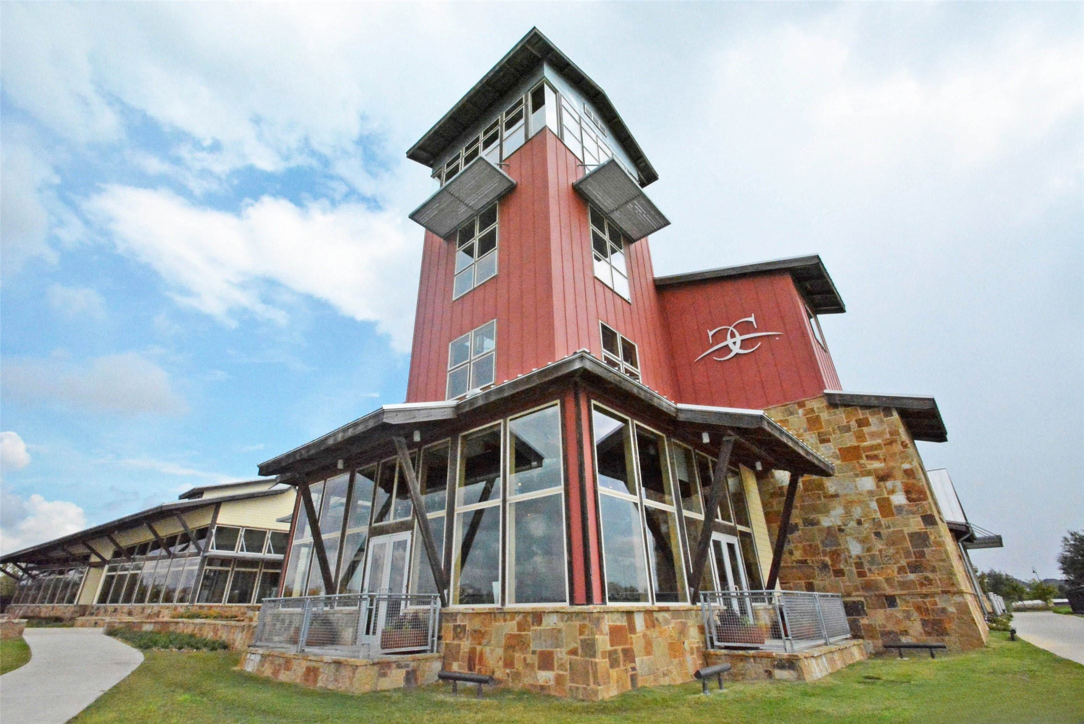 28706 Casen Ranch Lane Fulshear, TX 77441 - Photo 29 of 31 The Cross Creek Ranch Community Center serves as the heart of this award-winning master-planned community, offering residents gathering spaces, fitness facilities, and access to many of the neighborhood’s signature amenities. Nearby, homeowners enjoy resort-style pools, expansive green spaces, scenic lakes, and community events that create an active and connected lifestyle in one of Fulshear’s most sought-after communities.