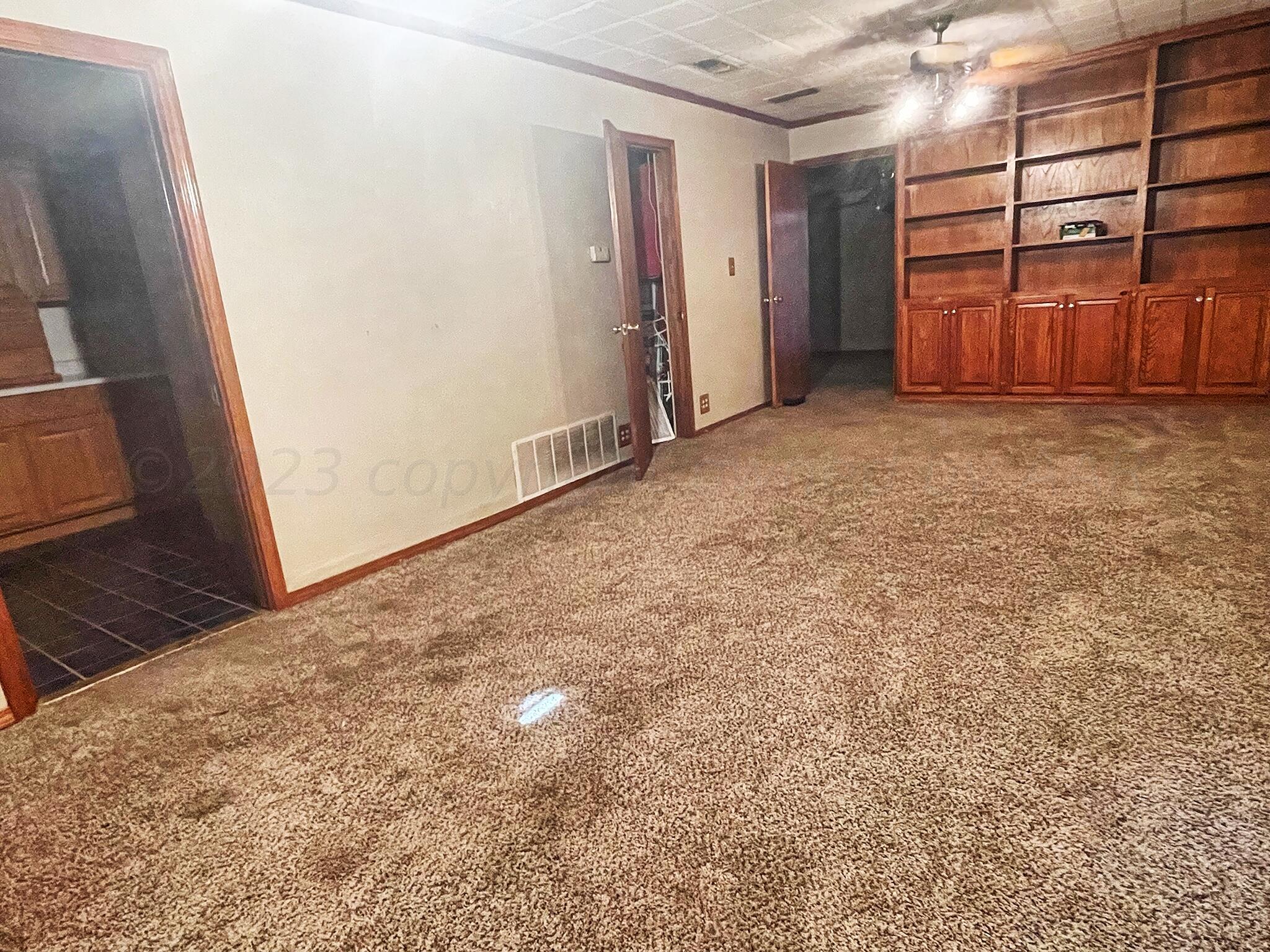 415 Southwest 5th Avenue Perryton, TX 79070 - Photo 9 of 16 a view of an empty room