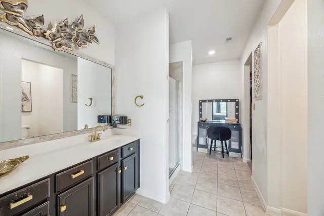 a bathroom with a bathtub and a sink