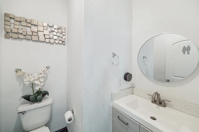 a picture of a wall with a white wall and a picture