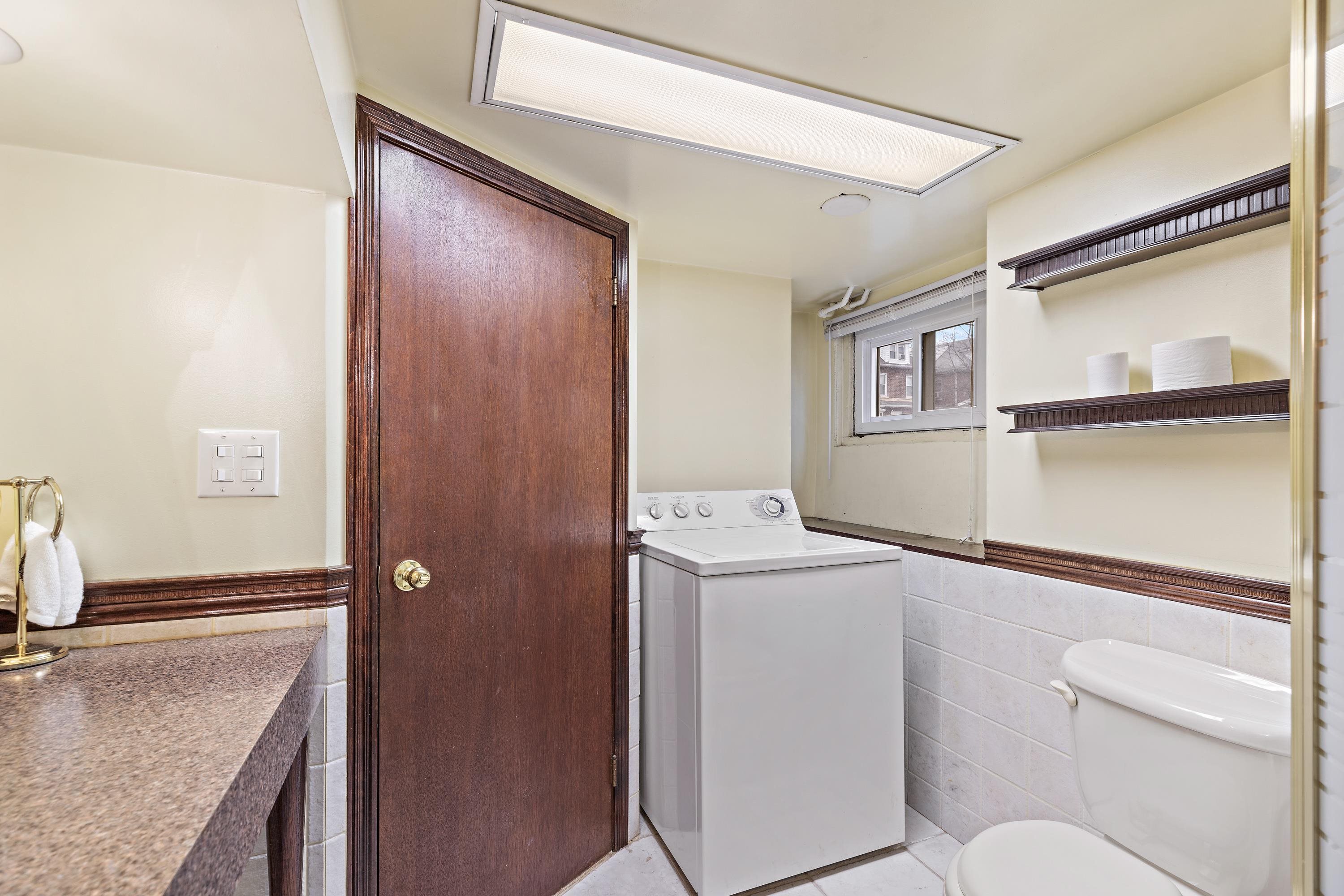 414 North 8th Street Fairview, NJ 07022 - Photo 21 of 22 a utility room with dryer and washer