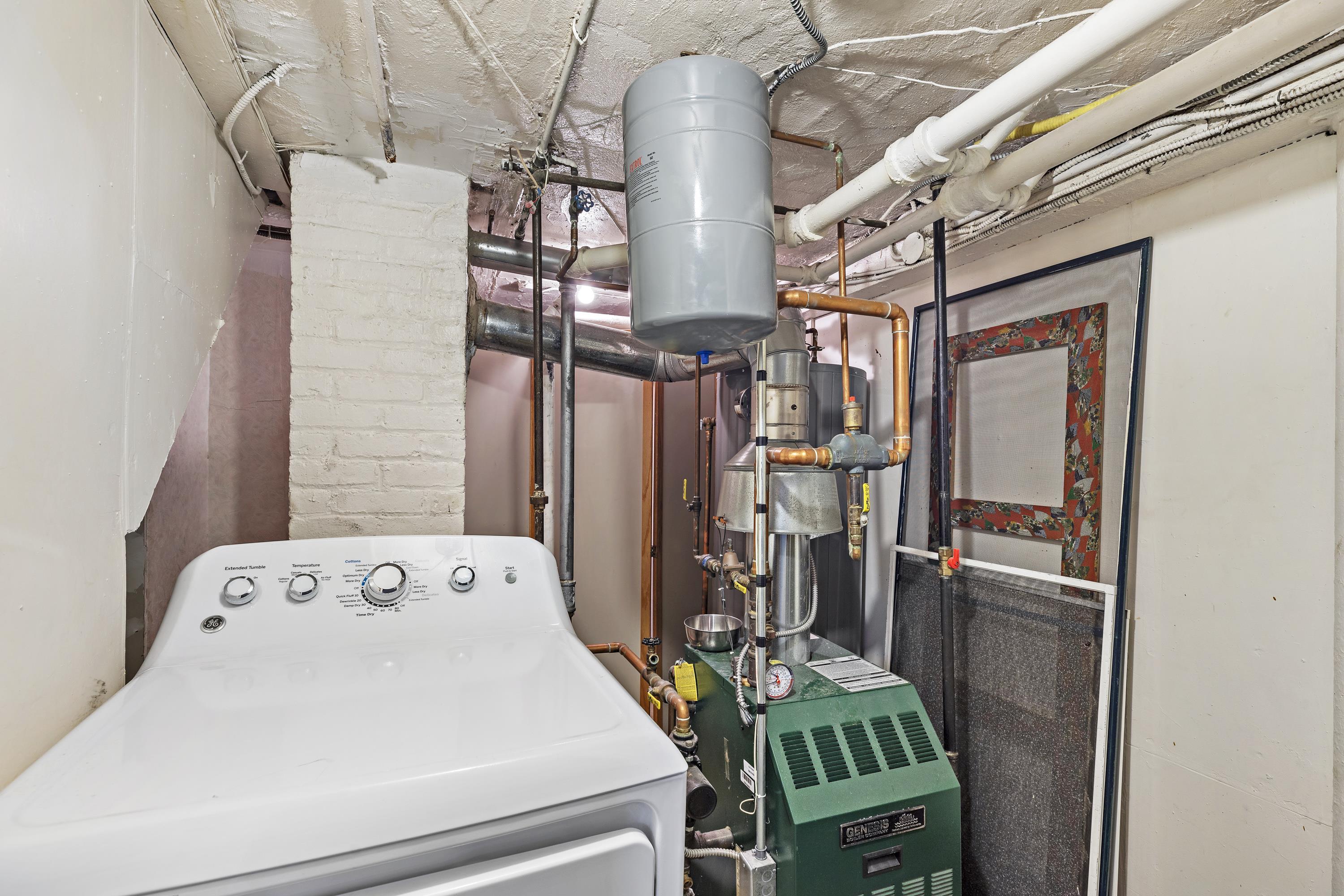 414 North 8th Street Fairview, NJ 07022 - Photo 22 of 22 a view of storage and utility room with two washing machine