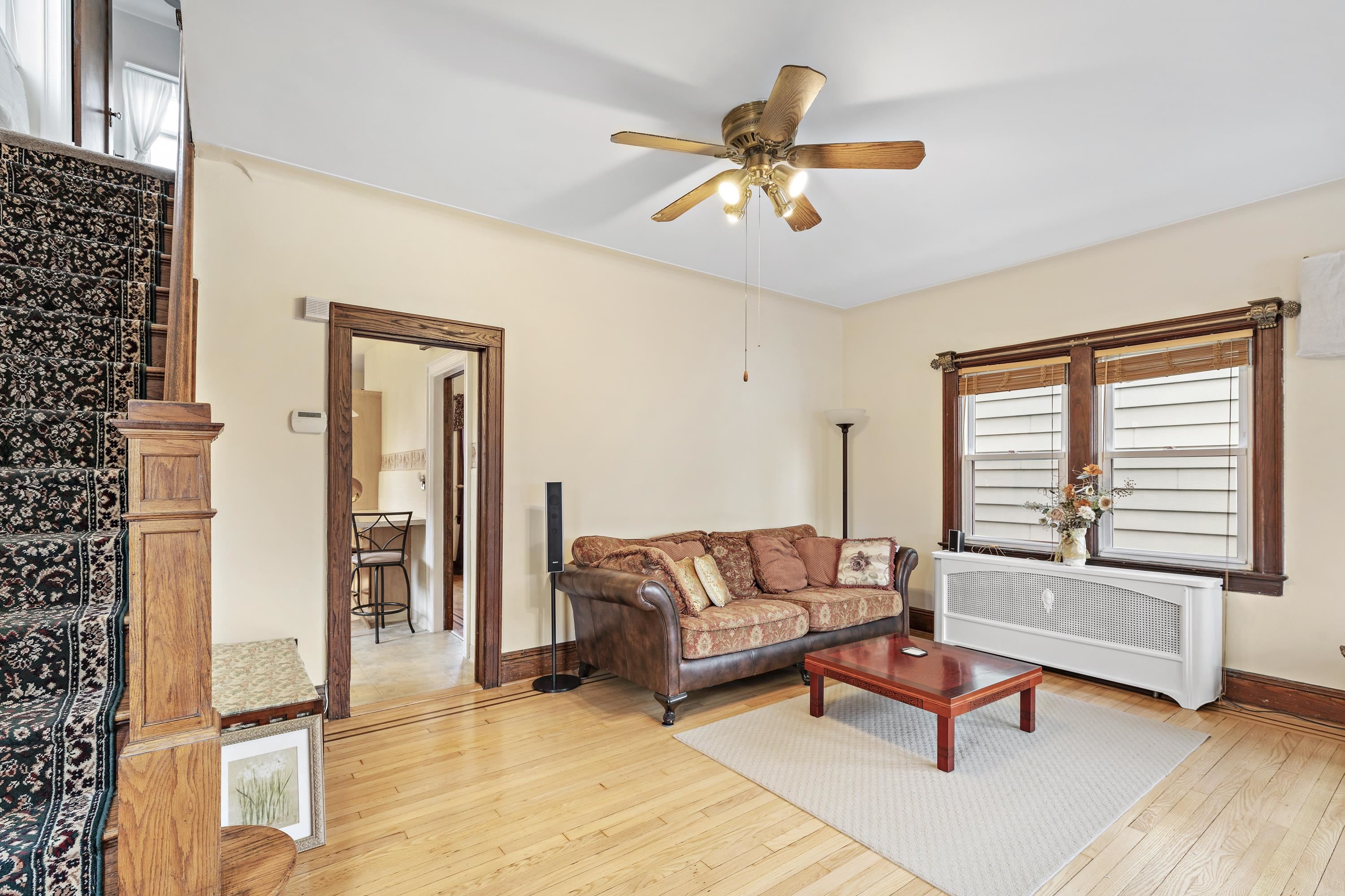 414 North 8th Street Fairview, NJ 07022 - Photo 5 of 22 a living room with furniture and a window