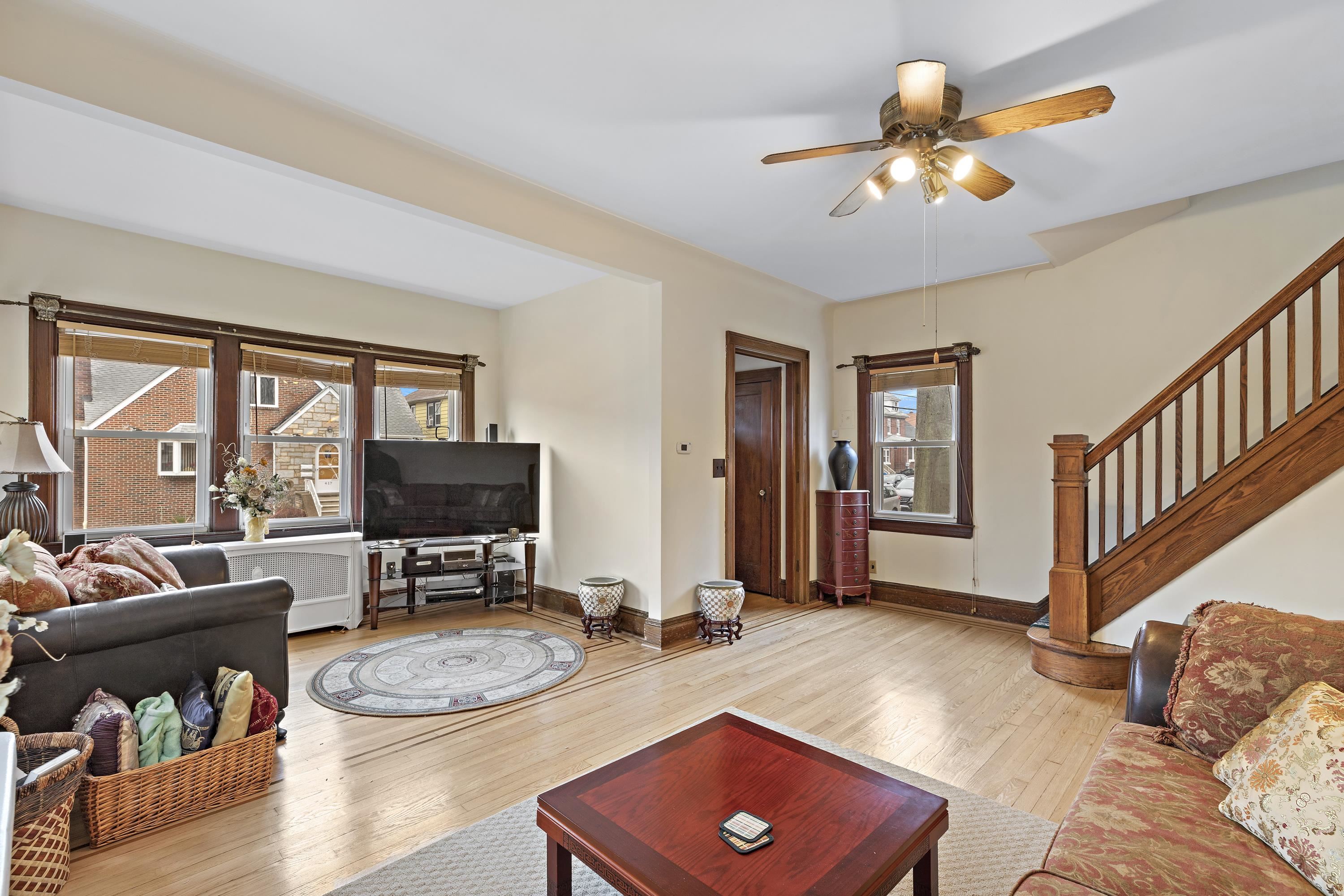 414 North 8th Street Fairview, NJ 07022 - Photo 7 of 22 a living room with furniture and a flat screen tv