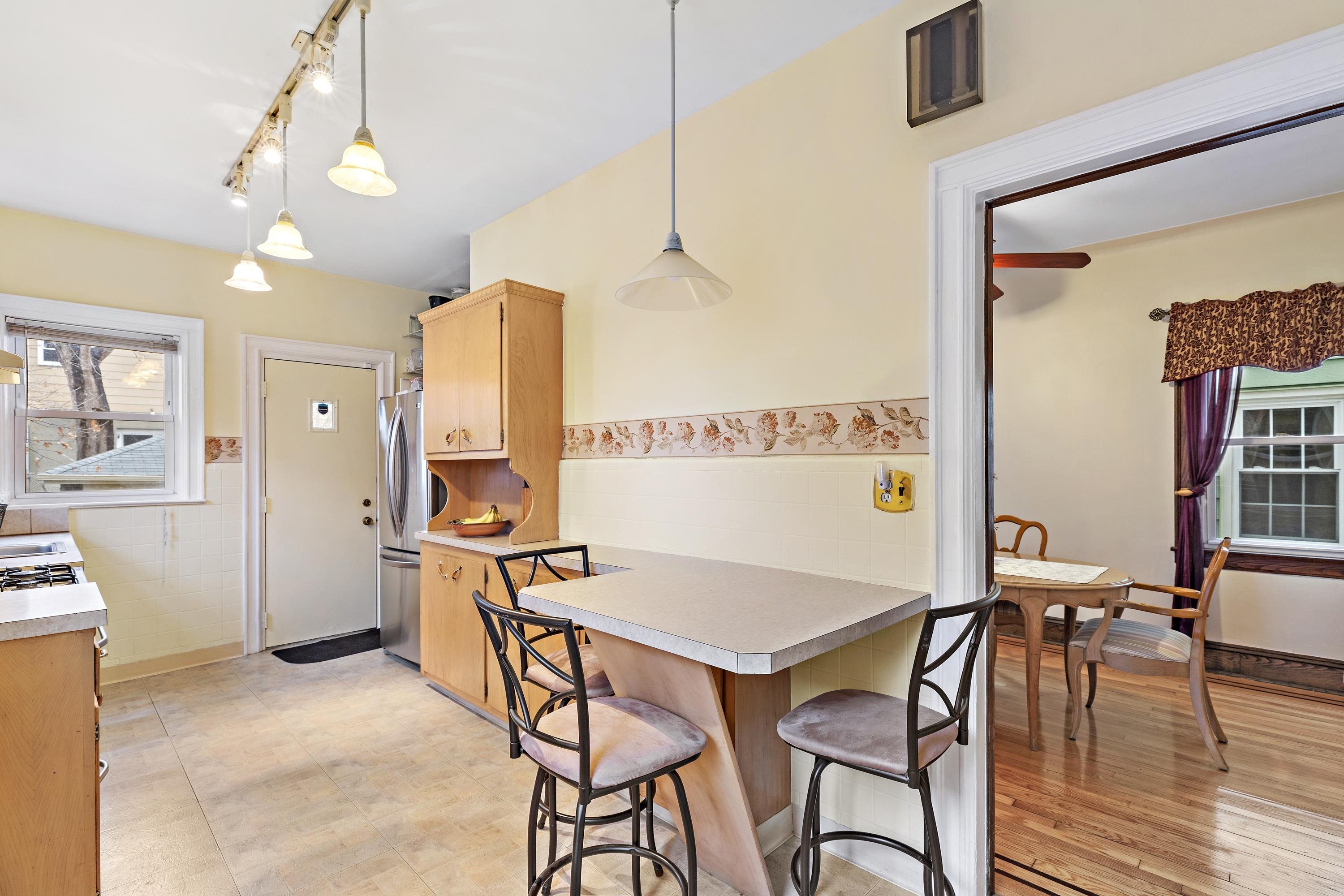 414 North 8th Street Fairview, NJ 07022 - Photo 10 of 22 a view of a dining room with furniture and wooden floor