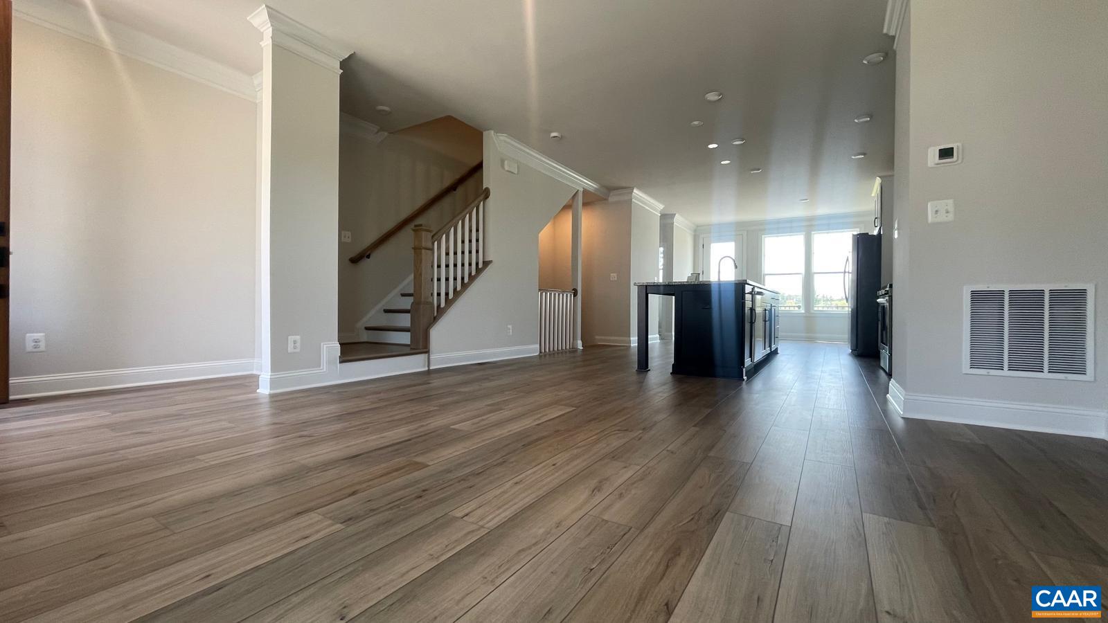 4006 Varick Street Charlottesville, VA 22901 - Photo 4 of 33 a view of a hallway with wooden floor
