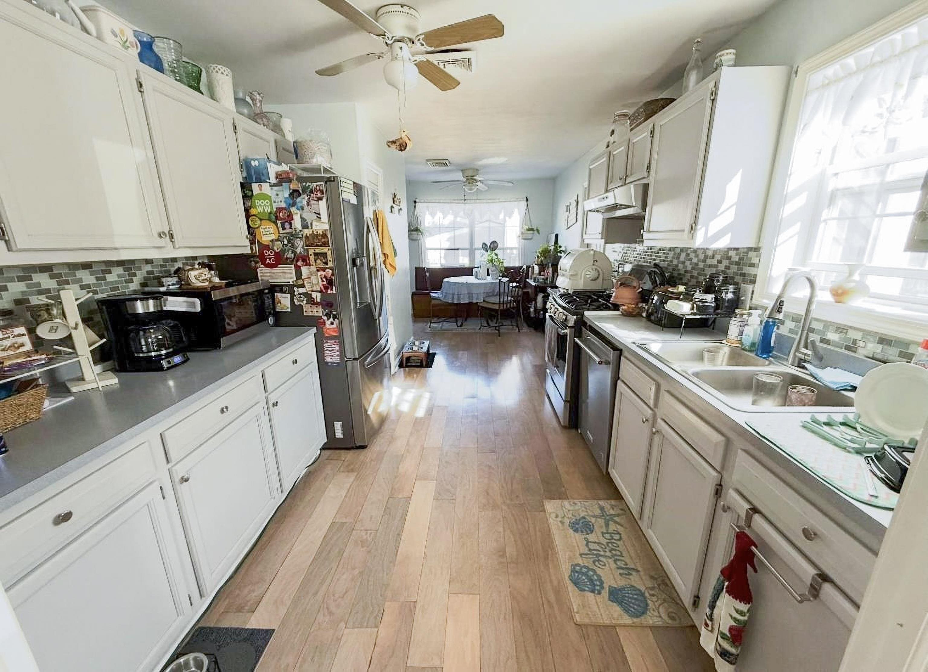 4 Rutledge Avenue Del Haven, NJ 08251 - Photo 4 of 21 a kitchen with sink a refrigerator and wooden floor
