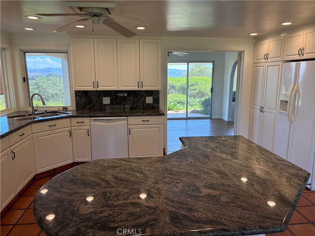 1905 Vista Del Norte Fallbrook, CA 92028 - Photo 11 of 29 a kitchen with a sink cabinets and window