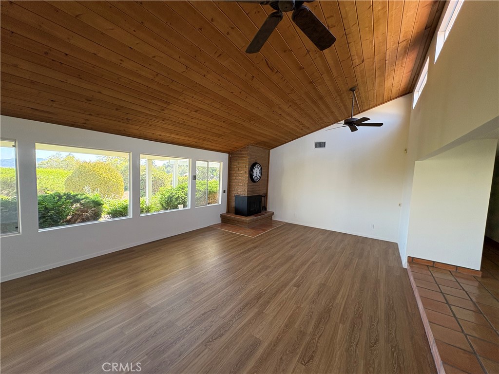 1905 Vista Del Norte Fallbrook, CA 92028 - Photo 3 of 29 a view of empty room with wooden floor and fan