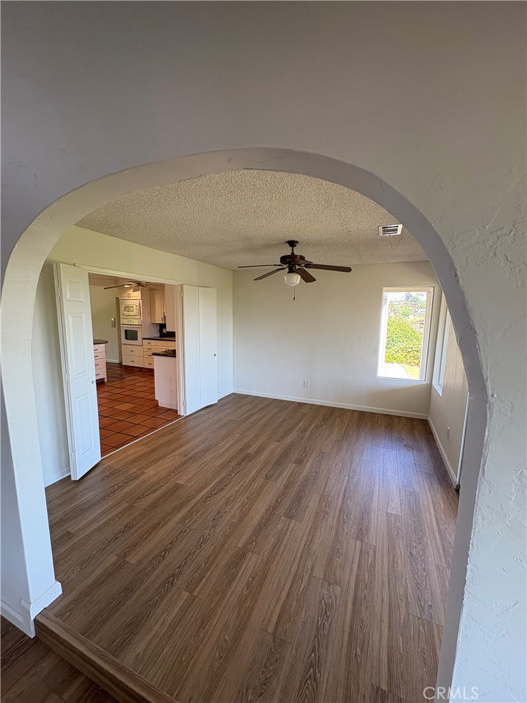 1905 Vista Del Norte Fallbrook, CA 92028 - Photo 6 of 29 a view of a hallway view with wooden floor and staircase