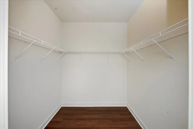a view of an empty walk in closet