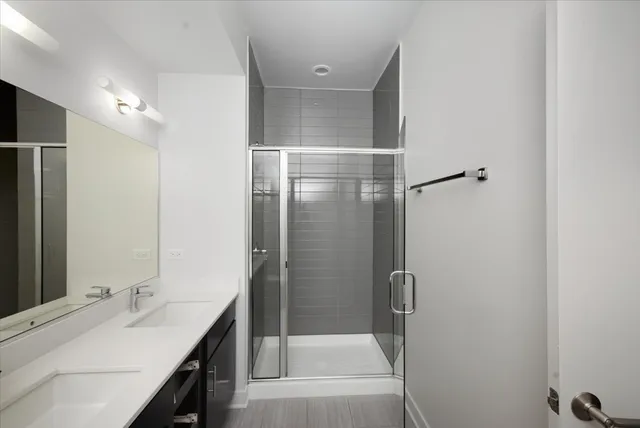 a bathroom with a bathtub and a sink