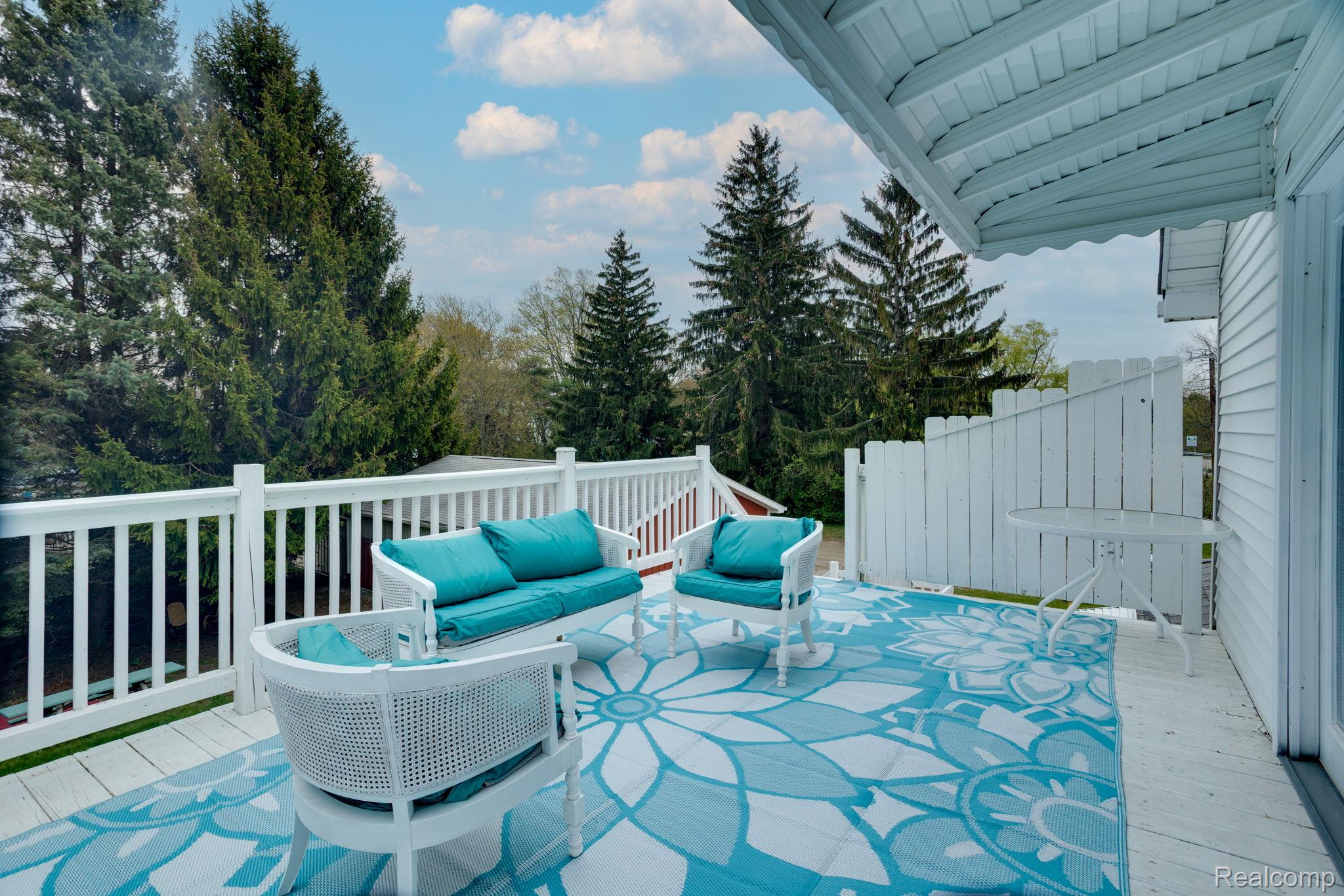 2400 North Lakeshore Road Carsonville, MI 48419 - Photo 5 of 33 View of patio with a deck and outdoor lounge area