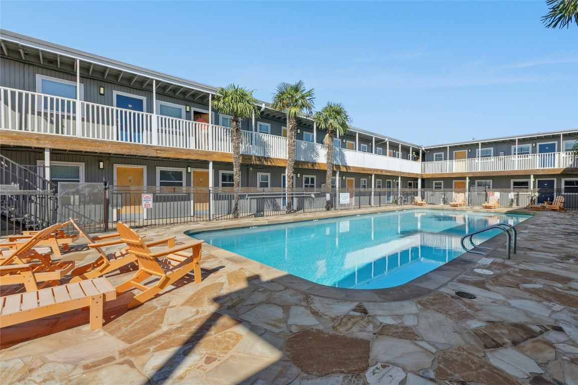 2401 Manor Road, Unit 214 Austin, TX 78722 - Photo 29 of 30 Community pool featuring a patio