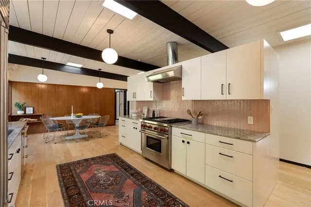 a large kitchen with cabinets