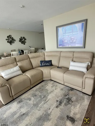 a kitchen with a stove and white cabinets