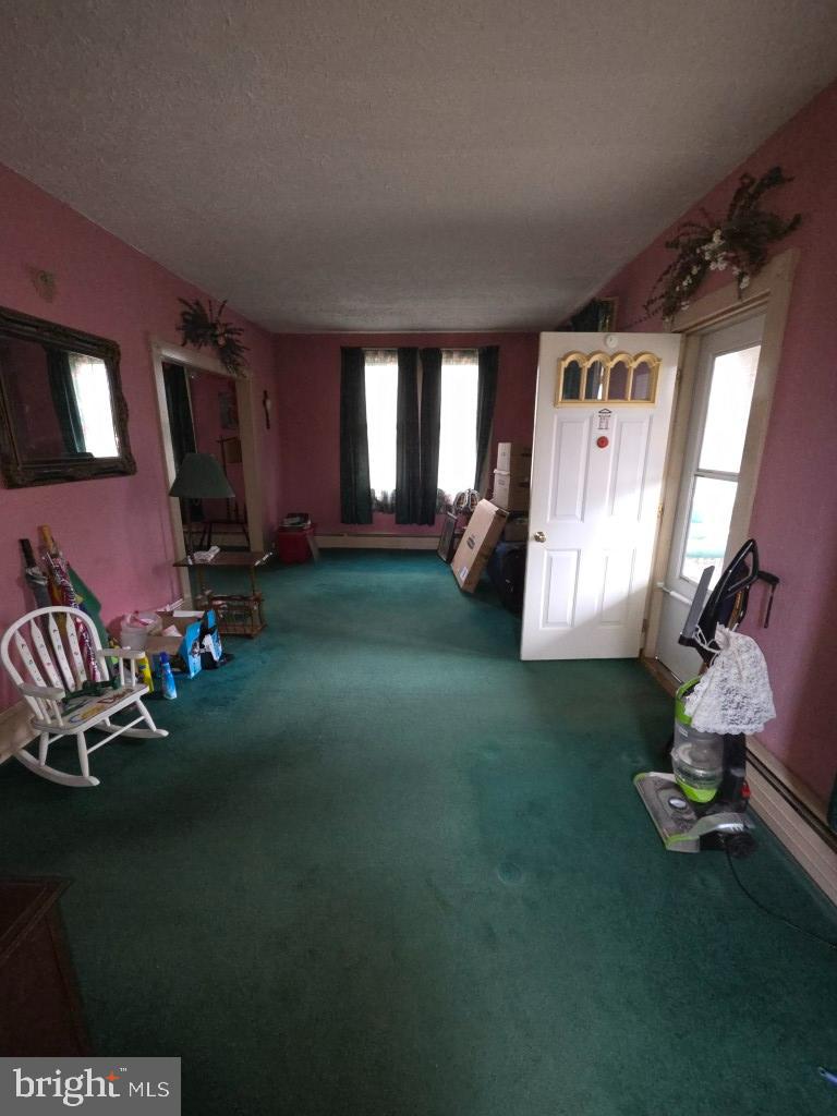 132 Mayfair Road Paxinos, PA 17860 - Photo 11 of 17 a room with gym equipment and a window