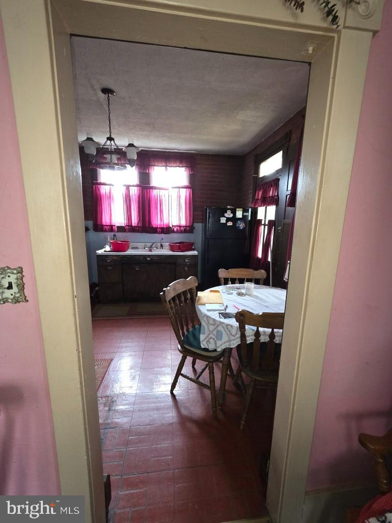 132 Mayfair Road Paxinos, PA 17860 - Photo 15 of 17 a room with furniture and chandelier